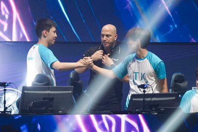 Rivals handshake after match on arena