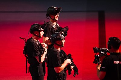 Players #02-03 in red light, camera operator filming