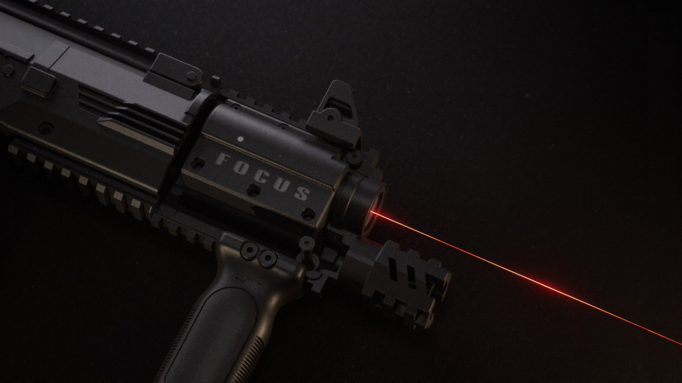 FOKUS optics mounted on a tactical laser tag tagger with laser beam